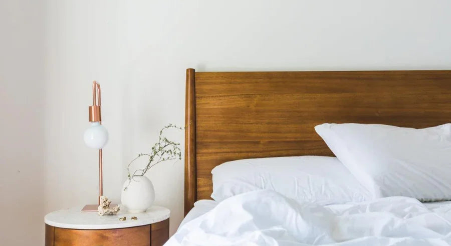 comfortable bed with side-table