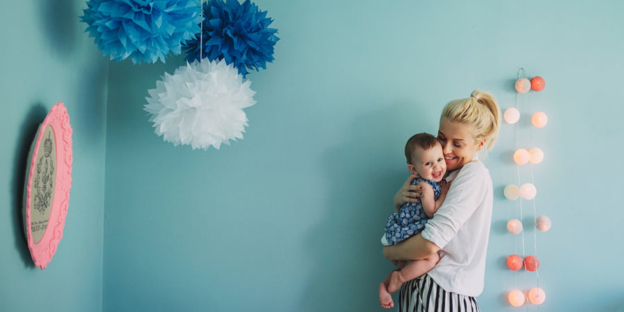 Mother holding baby in her arms